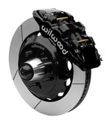Wilwood AERO6 front brake kit, five-lug GM truck/SUV iron ProSpindles, 14-inch GT rotors: Assembled brake view with black AERO6 caliper, gt slotted rotor, black hat/adapter and projecting hub with wheel studs.
