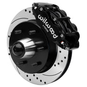 Wilwood Superlite 6R front brake kit, six-lug GM truck/SUV iron ProSpindles, 12.19-inch SRP rotors: Assembled brake view with black Superlite 6R caliper, drilled & slotted rotor, black hat/adapter and projecting hub with wheel studs.