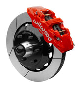 Wilwood AERO6 front brake kit, six-lug GM truck/SUV iron ProSpindles, 14-inch GT rotors: Assembled brake view with red AERO6 caliper, gt slotted rotor, black hat/adapter and projecting hub with wheel studs.