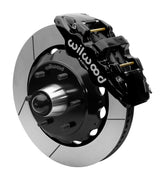 Wilwood AERO6 front brake kit, six-lug GM truck/SUV iron ProSpindles, 14-inch GT rotors: Assembled brake view with black AERO6 caliper, gt slotted rotor, black hat/adapter and projecting hub with wheel studs.