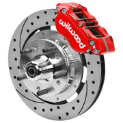 Wilwood Dynapro Radial front brake kit, GM second-generation AFX ProSpindles, 11.75-inch SRP rotors: Assembled brake view with red Dynapro Radial caliper, drilled & slotted rotor, silver hat/adapter and projecting hub with wheel studs.