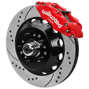 Wilwood Superlite 6R front brake kit, GM second-generation AFX ProSpindles, 14-inch SRP rotors: Assembled brake view with red Superlite 6R caliper, drilled & slotted rotor, black hat/adapter and projecting hub with wheel studs.