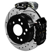 Wilwood Big Ford New Style Bronco 2.36-inch-offset axle rear assembly with a 12.19-inch drilled-and-slotted rotor, black Dynalite hydraulic service caliper and smaller electric parking caliper with motor housing
