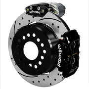 Wilwood Big Ford New Style 2.36-inch-offset axle rear assembly with a 12.19-inch drilled-and-slotted rotor, black Dynalite hydraulic service caliper and smaller electric parking caliper with motor housing