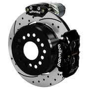 Wilwood Big Ford 2.36-inch-offset axle rear assembly with a 12.19-inch drilled-and-slotted rotor, black Dynalite hydraulic service caliper and smaller electric parking caliper with motor housing