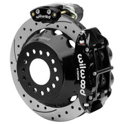 Wilwood Small Ford 2.50-inch-offset axle rear assembly with a 12.88-inch drilled-and-slotted rotor, black Superlite 4R hydraulic service caliper and smaller electric parking caliper with motor housing