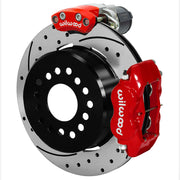 Wilwood Small Ford 2.66-inch-offset axle rear assembly with a 12.19-inch drilled-and-slotted rotor, red Dynalite hydraulic service caliper and smaller electric parking caliper with motor housing