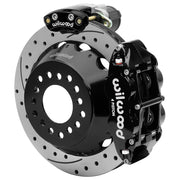 Wilwood Small Ford 2.66-inch-offset axle rear assembly with a 12.88-inch drilled-and-slotted rotor, black Superlite 4R hydraulic service caliper and smaller electric parking caliper with motor housing