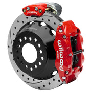 Wilwood Small Ford 2.66-inch-offset axle rear assembly with a 12.88-inch drilled-and-slotted rotor, red Superlite 4R hydraulic service caliper and smaller electric parking caliper with motor housing