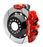 Wilwood 12 Bolt 2.75-inch-offset axle rear assembly with a 14.00-inch GT-slotted rotor, red AERO4 hydraulic service caliper and smaller electric parking caliper with motor housing