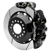 Wilwood Big Ford New Style 2.36-inch-offset axle rear assembly with a 14.00-inch GT-slotted rotor, black AERO4 hydraulic service caliper and smaller electric parking caliper with motor housing