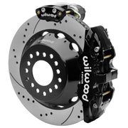 Wilwood Big Ford 2.36-inch-offset axle rear assembly with a 14.00-inch drilled-and-slotted rotor, black AERO4 hydraulic service caliper and smaller electric parking caliper with motor housing