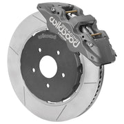 Wilwood gray anodized front caliper beside the assembled 14.00-inch slotted rotor for the AERO4-ST GM road-race brake conversion