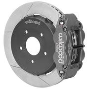 Wilwood gray anodized rear caliper beside the assembled 13.00-inch slotted rotor for the Corvette C5/C6 and Cadillac XLR race brake conversion