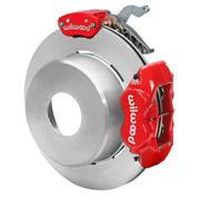 Wilwood red rear caliper beside the assembled 12.19-inch undrilled rotor for the Currie Pro-Tour blank-pattern floater brake conversion, with a separate MC4 parking caliper