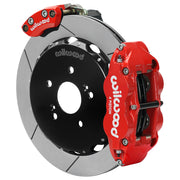 Wilwood red rear caliper beside the assembled 12.88-inch slotted rotor for the Honda S2000 electric parking brake conversion, showing the separate electric parking caliper