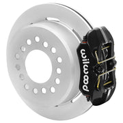 Wilwood black rear caliper beside the assembled 11.00-inch undrilled rotor for the Ford Explorer 8.8 low-profile 2.54-inch offset brake conversion