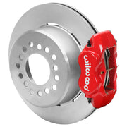 Wilwood red rear caliper beside the assembled 12.19-inch undrilled rotor for the Ford Explorer 8.8 Dynalite 2.54-inch offset brake conversion