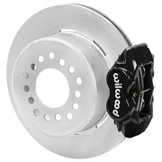 Wilwood black rear caliper beside the assembled 12.19-inch undrilled rotor for the GM S10 Dynalite 2.75-inch offset brake conversion