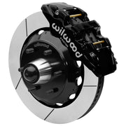 Wilwood black front caliper beside the assembled 14.00-inch slotted rotor for the Chevrolet/GMC six-lug AERO6 drop-spindle brake conversion, with the hub and wheel studs visible
