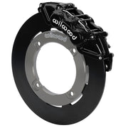 Wilwood black front caliper beside the assembled 11.25-inch undrilled rotor for the Honda Talon UTV6 brake conversion