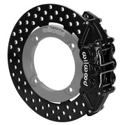 Wilwood black rear caliper beside the assembled 11.25-inch drilled rotor for the Honda Talon UTV4 brake conversion