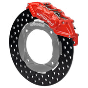 Wilwood red front caliper beside the assembled 11.25-inch drilled rotor for the Polaris RZR Turbo and Pro XP UTV6 brake conversion