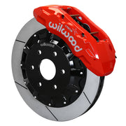 Wilwood front TX6R brake kit for Ram 1500 six-lug: Red-finish TX6R caliper over a slotted rotor and black center hat in an assembled brake view.