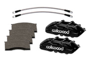 Wilwood front D11 brake kit for Ford/Mercury disc spindles: Black D11 caliper pair with pad friction faces and two braided flexlines visible in a closer parts grouping.