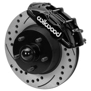 Wilwood front D11 brake kit for Ford/Mercury disc-spindle hub conversion: Black D11 caliper above a drilled and slotted rotor with a projecting wheel hub, five studs and a dust cap.