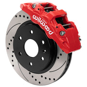 Wilwood front AERODM brake kit for later GM 1500 trucks/SUVs: Assembled red-finish AERODM caliper over a drilled and slotted rotor with a black center and large hub opening.