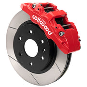 Wilwood front AERODM brake kit for later GM 1500 trucks/SUVs: Assembled red-finish AERODM caliper over a slotted rotor with a black center and large hub opening.