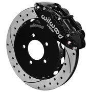 Wilwood front FNSL6R brake kit for Honda Civic/Acura Integra street package: Black FNSL6R caliper over a drilled and slotted rotor and black center hat in an assembled brake view.