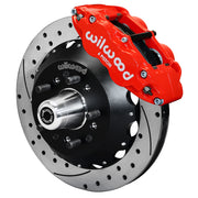 Wilwood front FNSL6R brake kit for Tri-Five ProSpindle 12.88-inch configuration: Assembled drilled and slotted rotor and black hat with a red-finish FNSL6R caliper, projecting hub, five studs and a silver dust cap.