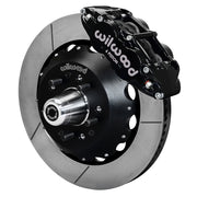 Wilwood front FNSL6R brake kit for Tri-Five ProSpindle 14-inch Superlite configuration: Assembled slotted rotor and black hat with a black FNSL6R caliper, projecting hub, five studs and a silver dust cap.