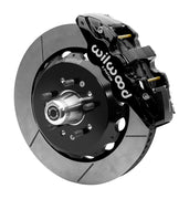 Wilwood front AERO6 brake kit for Tri-Five ProSpindle AERO6 conversion: Assembled slotted rotor and black hat with a black AERO6 caliper, projecting hub, five studs and a silver dust cap.