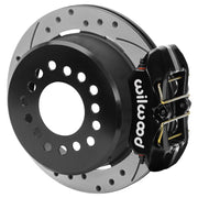 Wilwood rear Forged Dynapro Low Profile brake kit for staggered BOP 11-inch configuration: Assembled rear brake showing a black Forged Dynapro Low Profile caliper, drilled and slotted rotor and deep parking-drum center.