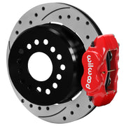 Wilwood rear Forged Dynalite Internal brake kit for BOP 12.19-inch staggered layout: Assembled rear brake showing a red-finish Forged Dynalite Internal caliper, drilled and slotted rotor and deep parking-drum center.