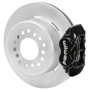 Wilwood rear Forged Dynalite Internal brake kit for BOP 12.19-inch staggered layout: Assembled rear brake showing a black Forged Dynalite Internal caliper, undrilled, with short machined face grooves rotor and deep parking-drum center.