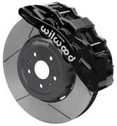 Wilwood front SX6R brake kit for Corvette C8: Black SX6R caliper over a slotted rotor and silver center hat in an assembled brake view.