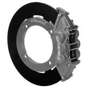 Wilwood rear UTV4 brake kit for Honda Talon rear race package: Assembled gray anodized UTV4 caliper over a black solid rotor ring and silver dynamic-mount adapter; the center opening is visible.