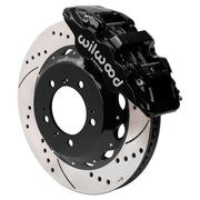 Wilwood front AERO6 brake kit for Porsche 996/997 and Boxster/Cayman: Black AERO6 caliper over a drilled and slotted rotor and black center hat in an assembled brake view.