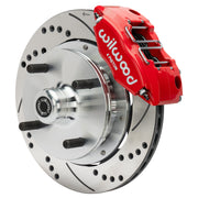 Wilwood front brake assembly with red four-piston caliper, drilled and slotted rotor and wheel hub