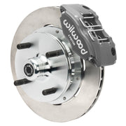 Wilwood front brake assembly with black four-piston caliper, plain-face rotor and wheel hub