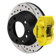 Wilwood Porsche 911 (1984–1989) rear 11.42 × 0.95-inch brake assembly, yellow D31 caliper and srp drilled & slotted rotor