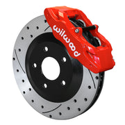 Wilwood red SLC56 front caliper beside the assembled 12.80-inch drilled and slotted rotor and hat for Corvette C6 Base