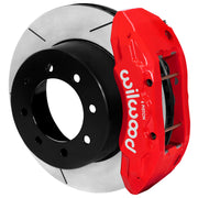 Wilwood red TX6-DM rear caliper beside the assembled 15.50-inch slotted rotor and hat for Ford Super Duty 2023–2025