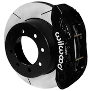 Wilwood black TX6-DM rear caliper beside the assembled 15.50-inch slotted rotor and hat for Ford Super Duty 2023–2025