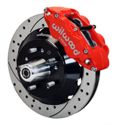 Wilwood red Superlite 6R front caliper beside the assembled 12.88-inch drilled and slotted rotor and hub for listed Chevrolet full-size and Corvette spindle