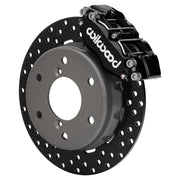 Wilwood black NDPR front caliper beside the assembled 11.60-inch drilled rotor and hat for Can-Am Maverick R